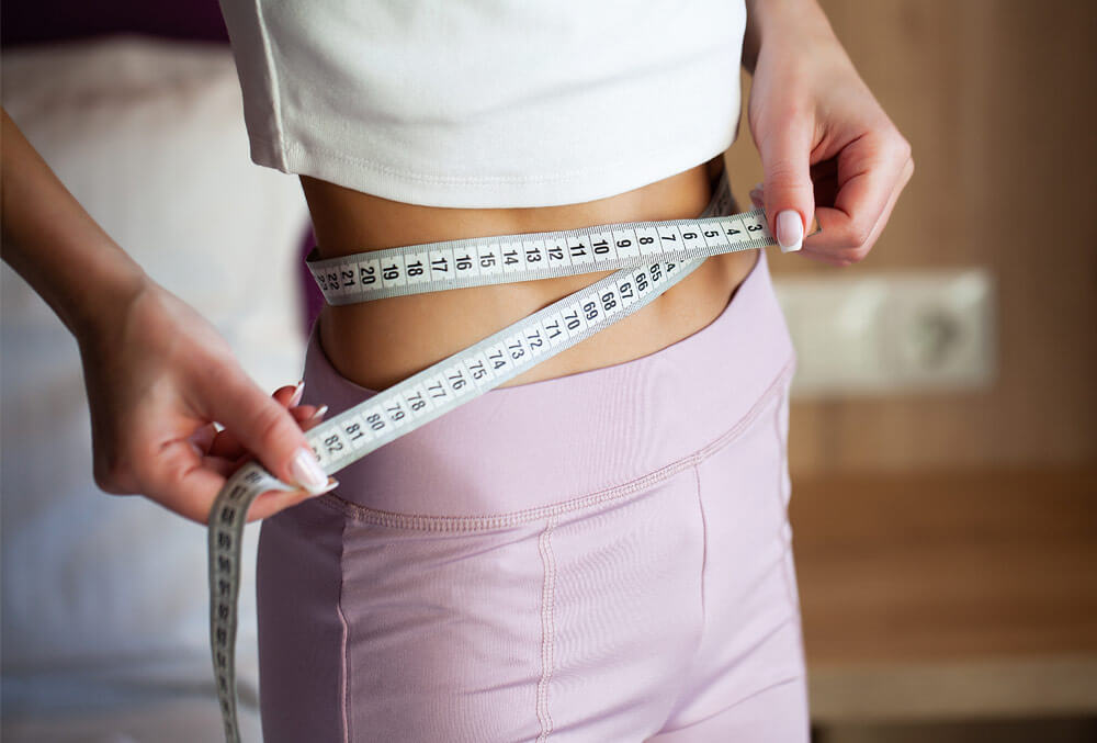 жінка з рулеткою - схуднення 