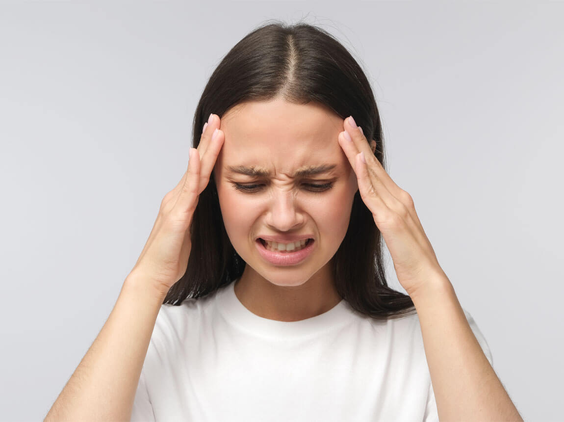 жінка - головний біль, мігрень