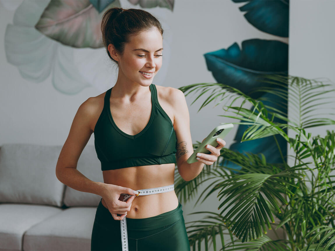 жінка з міркою, схуднення, спалювач жиру