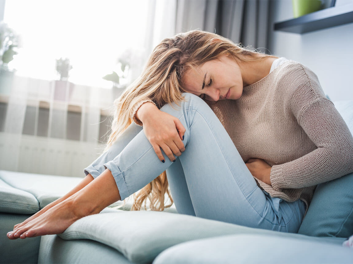 жінка - болі в животі, запори